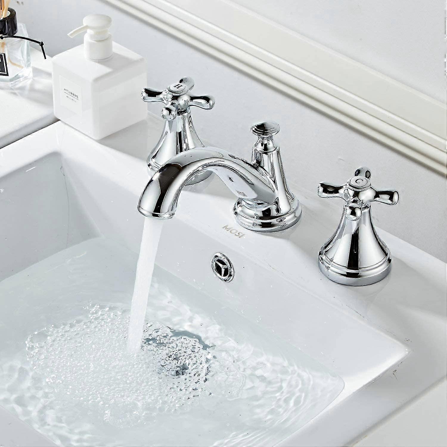Polished Chrome Bathroom Sink Faucet With Two Handles And Three Holes