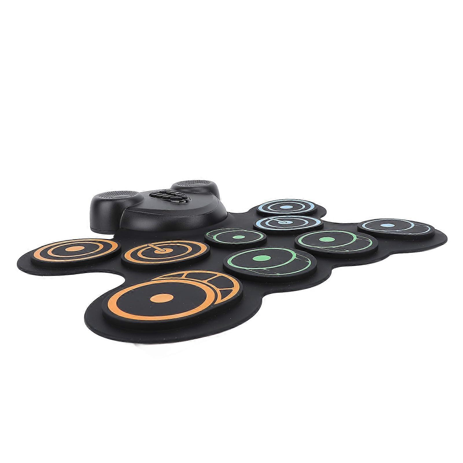 Bateria eletrônica recarregável via USB com alto-falantes duplos e pads de silicone enroláveis ​​para música e jogos.
