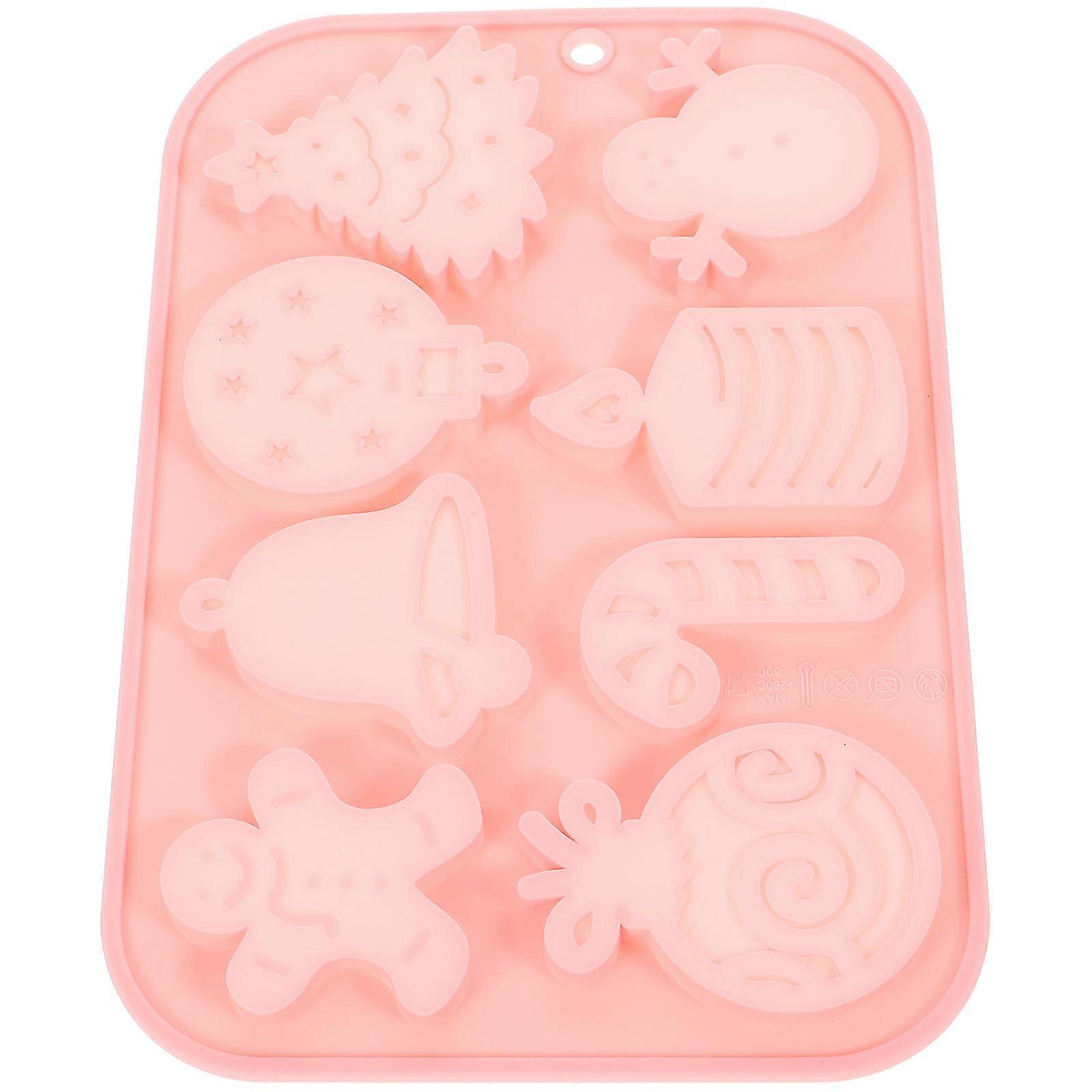 The **Pink Cavity Silicone Christmas Candy Mold** is a versatile and user friendly baking tool designed for both home bakers and professional cake