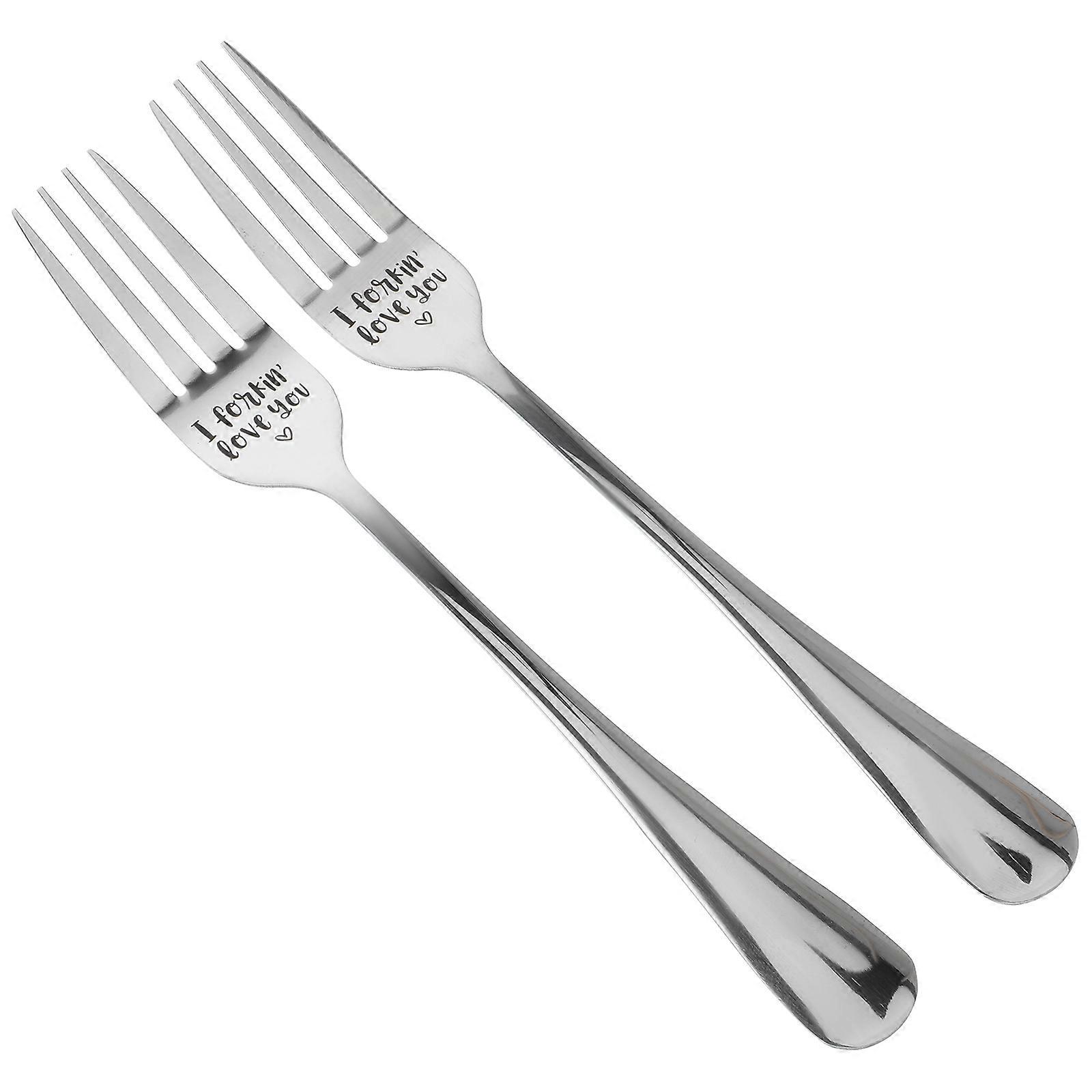 Here's a refined and engaging product description based on the title you provided:

 

**2pcs Engraved Stainless Steel Forks – Elegant Cutlery for