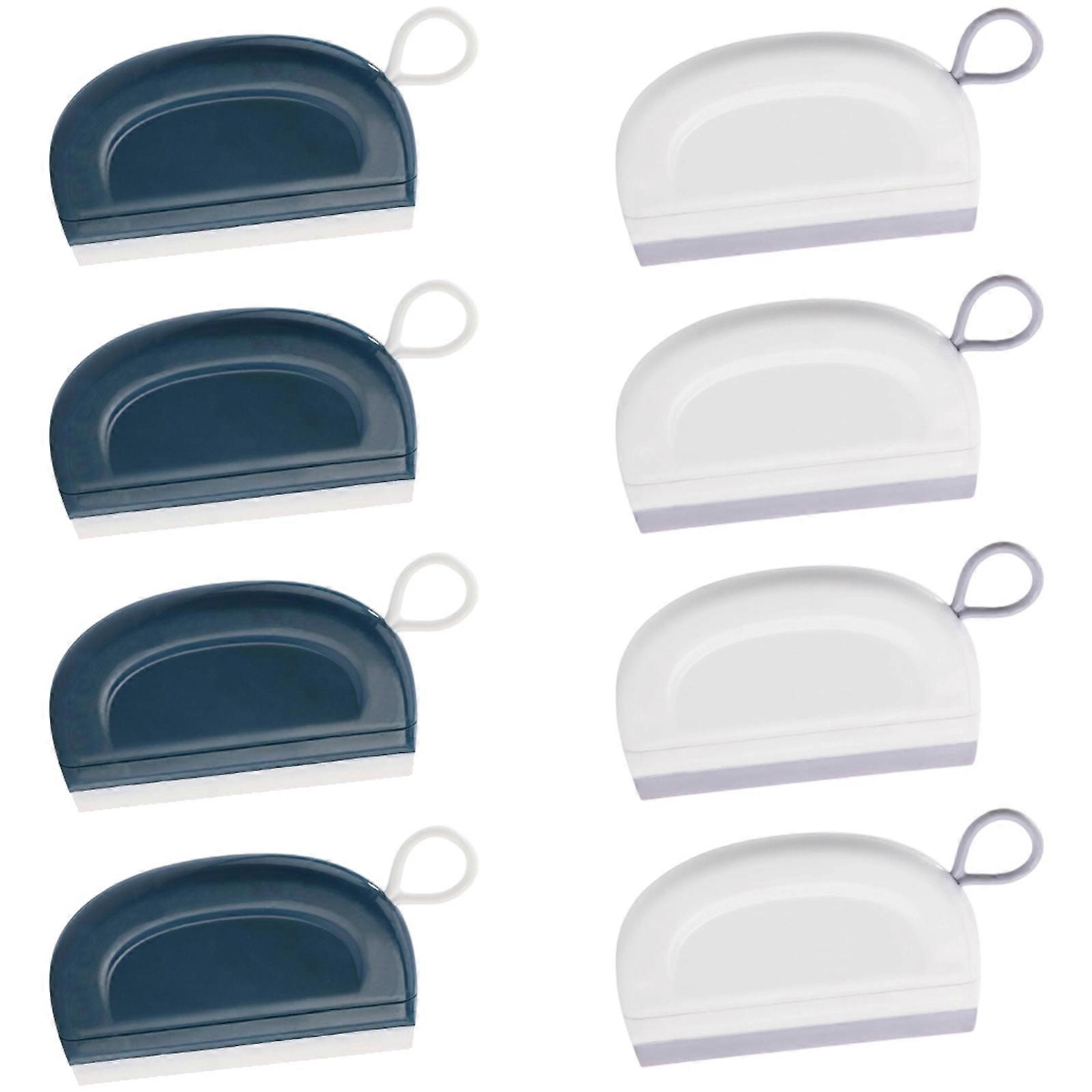 Compact Glass Scraper With Sturdy Plastic Handle Multipurpose Use On Window Windshields Smooth Finishes Multicolor