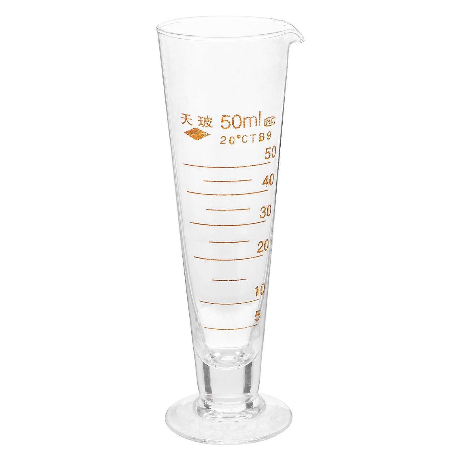 It sounds like you're describing a **glass graduated cylinder** commonly used in laboratories, but also suitable for precise liquid measurements in