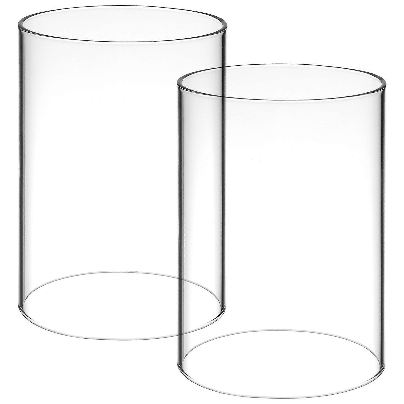 Here's a refined and professional product description for your item:
**2pcs Transparent Glass Candle Holder Tube Shade – Windproof Candle Chimney