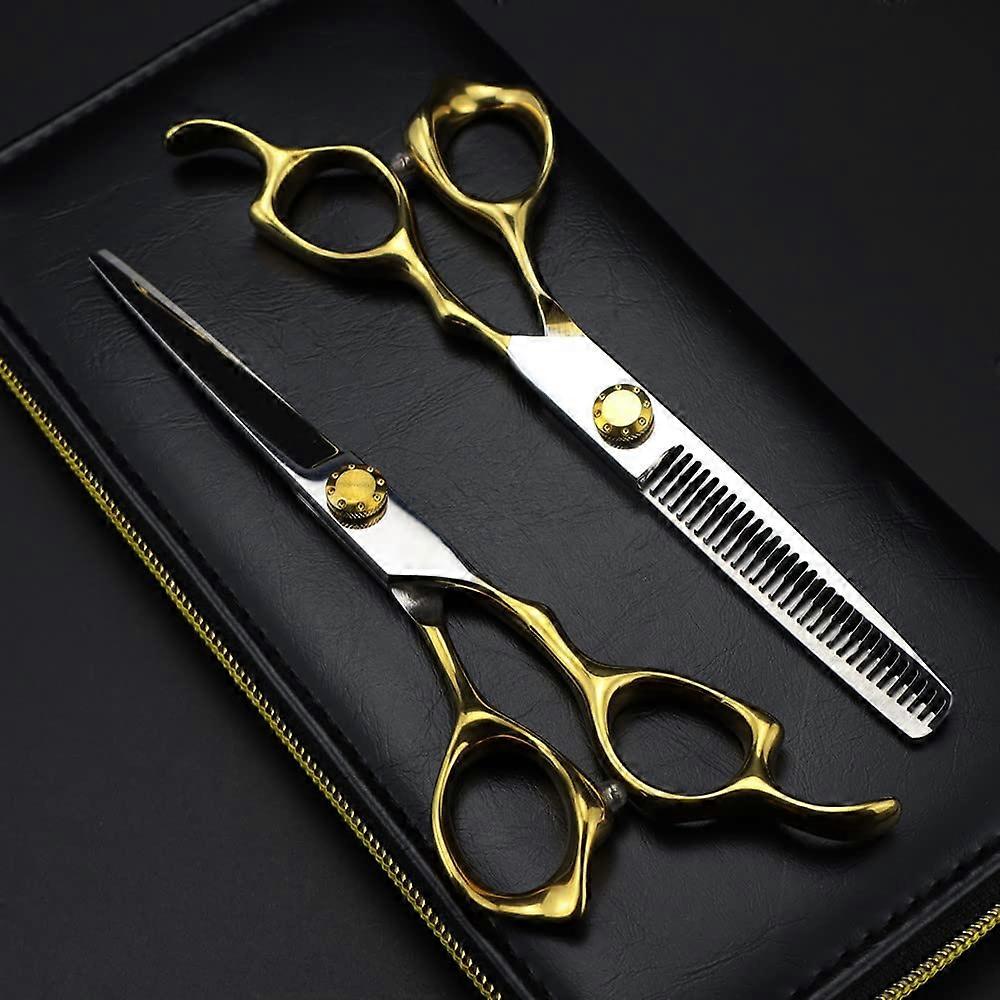 Tesoura de corte de cabelo profissional japonesa de 6 polegadas em aço, dourada, com cabo ergonômico.