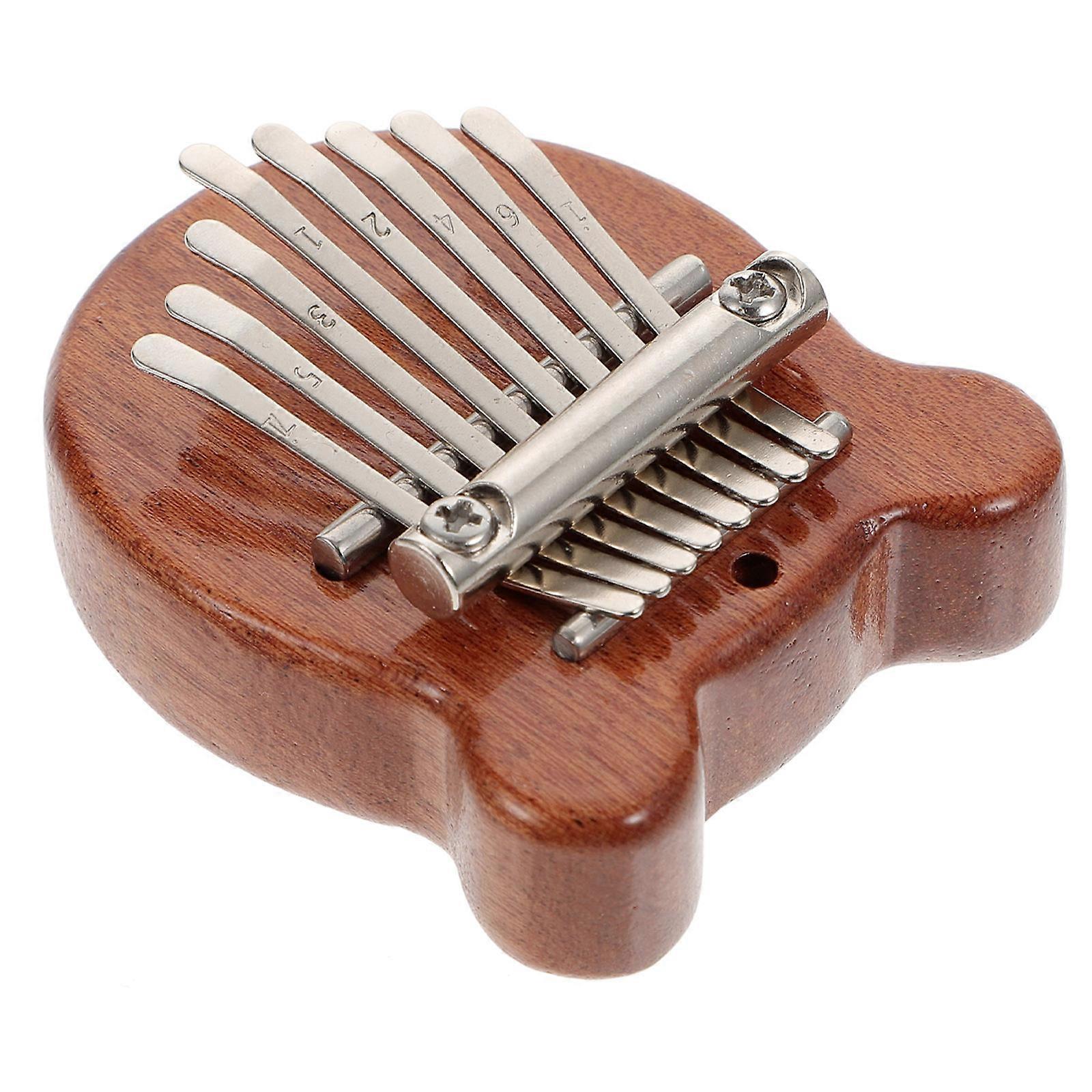 Portable Mini Finger Piano with Pure Tone for Playing Brown Synthetic Material Toy