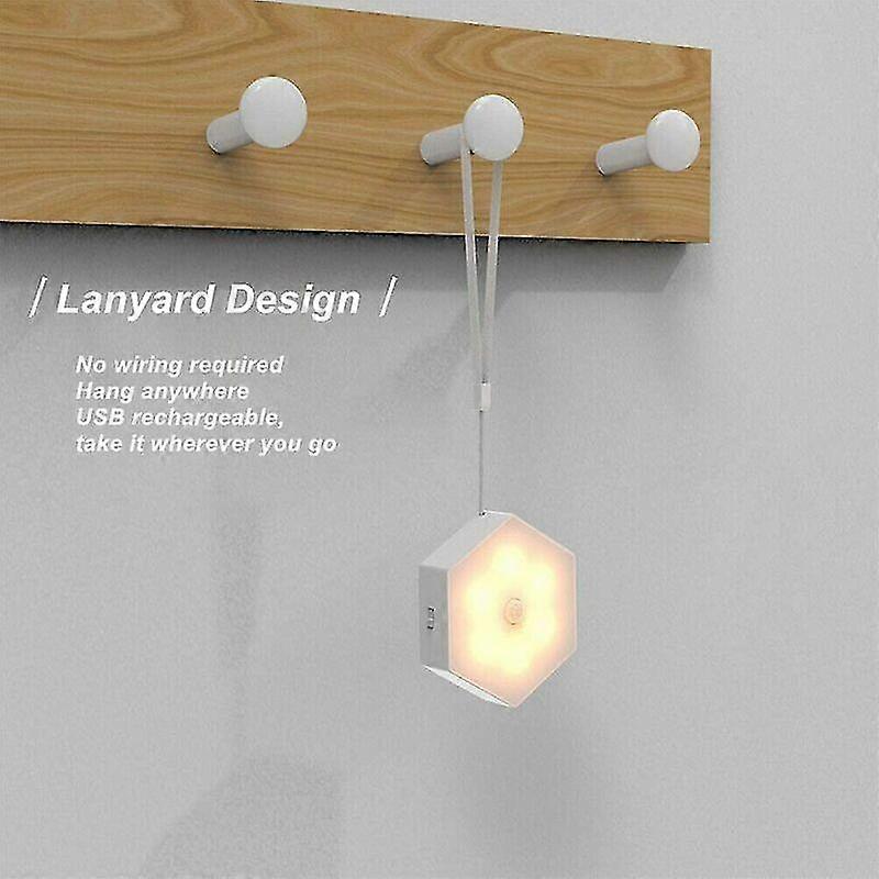 Children's night light featuring a motion sensor, USB rechargeable table lamp, wireless wall-mounted light, includes cord and adhesive patch