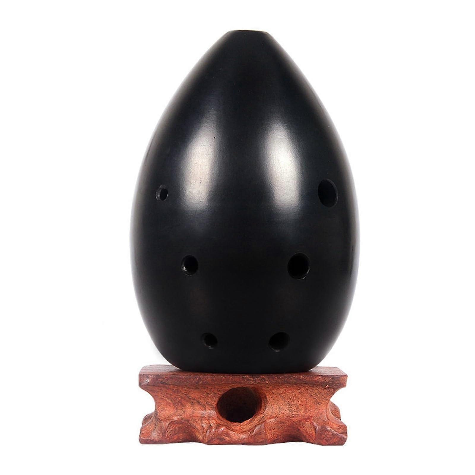 Beginners practice the musical instrument ocarina. Ref: 5536