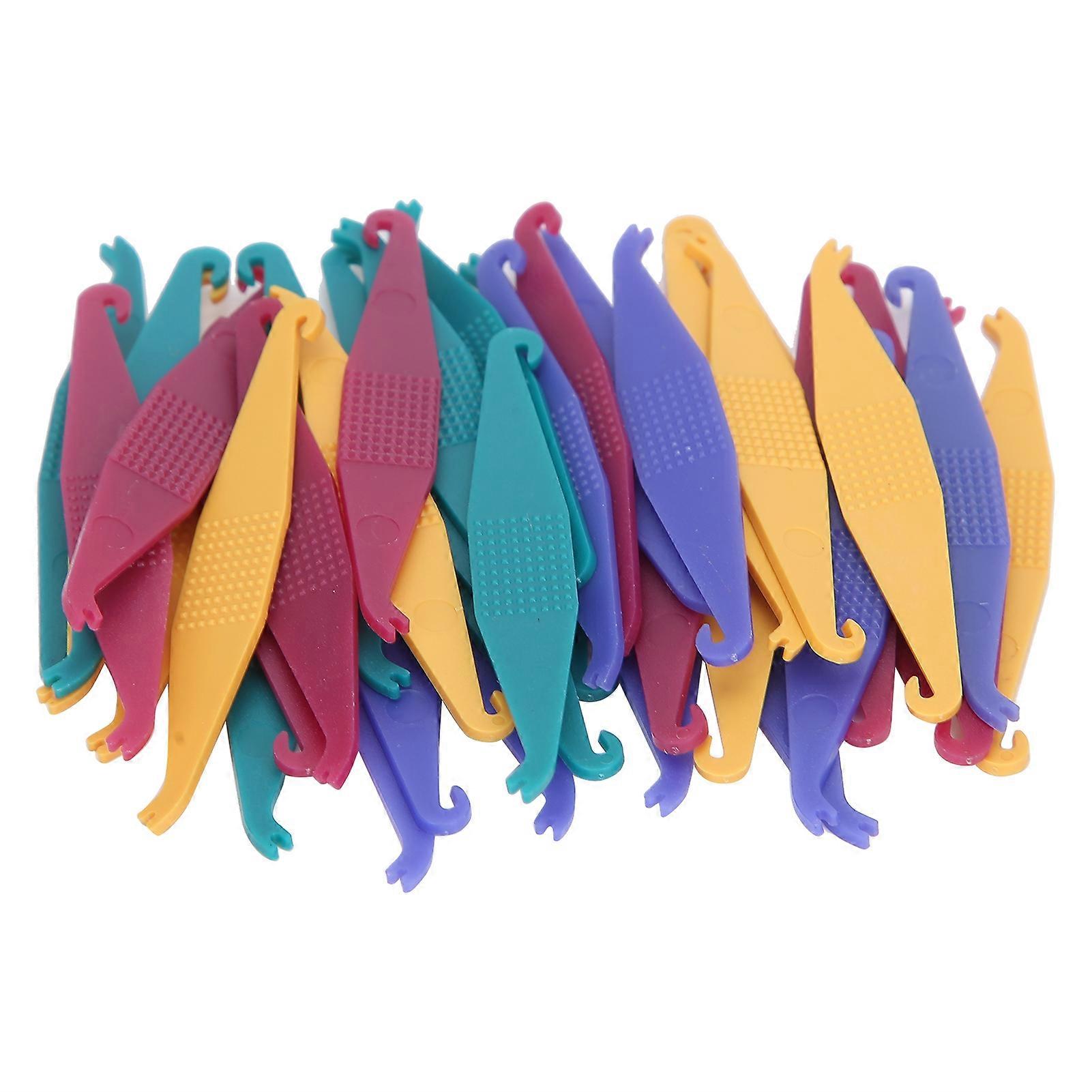 40pcs Elastici dentali Placers Denti dentali ortodontici Elastico in plastica Elastico Elastico Elastico Fascia Placers