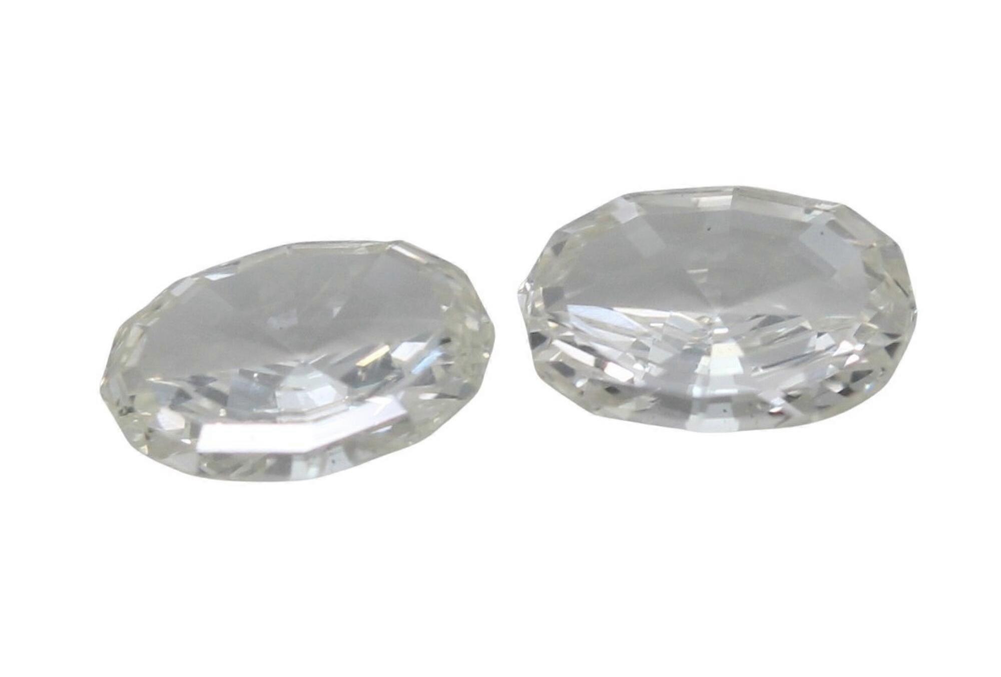 A Pair of Oval Step Cut Cut Natural Mined Loose Diamonds (0.85 Ct,K Color,VS2 Clarity)