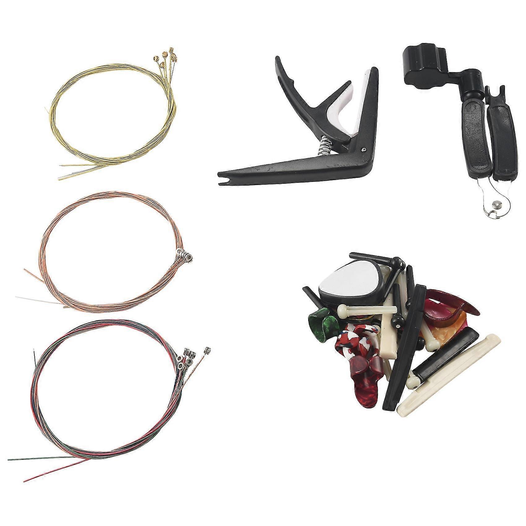 34 st gitarrtillbehörssats inklusive gitarrplock, capo, akustiska gitarrsträngar, 3 i 1strängad vind