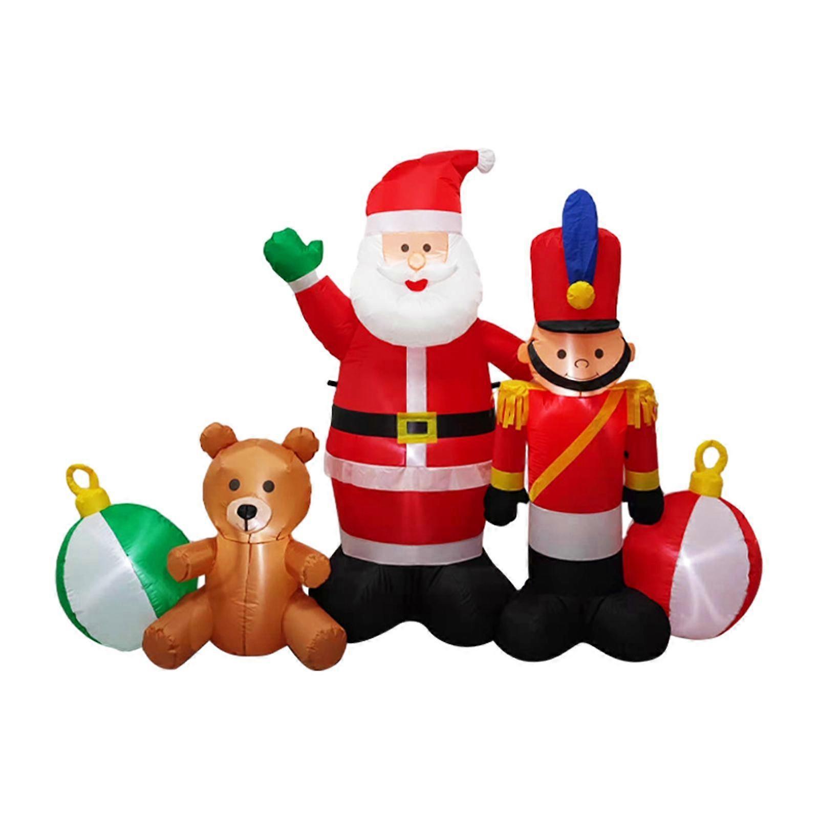 クリスマスのインフレータブルサンタクロースはLEDライトのかわいい屋外装飾で構築されています