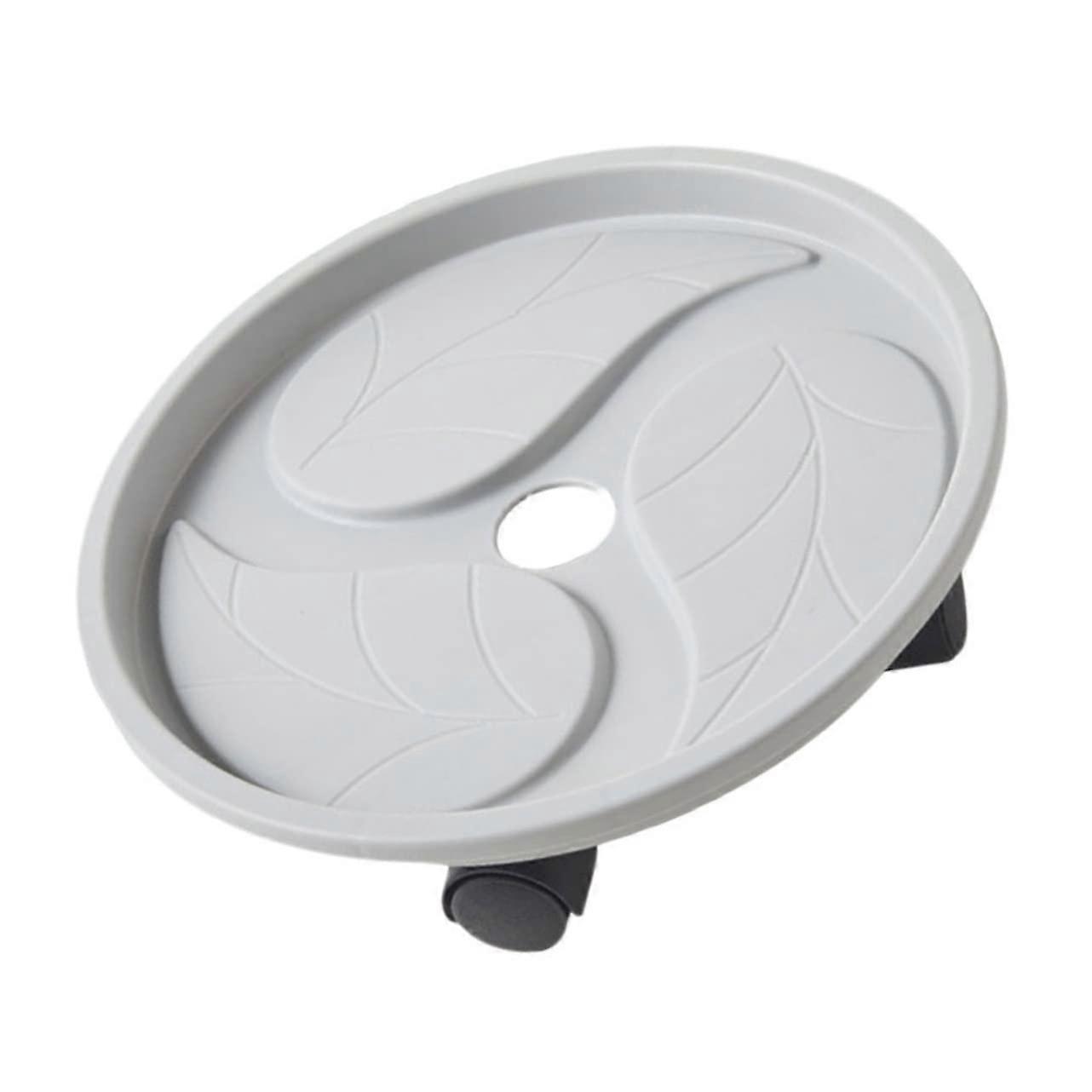 Round plant roller with swivel wheels, sturdy and mobile flower pot saucer for indoor and outdoor use, suitable for heavy pots and vases.