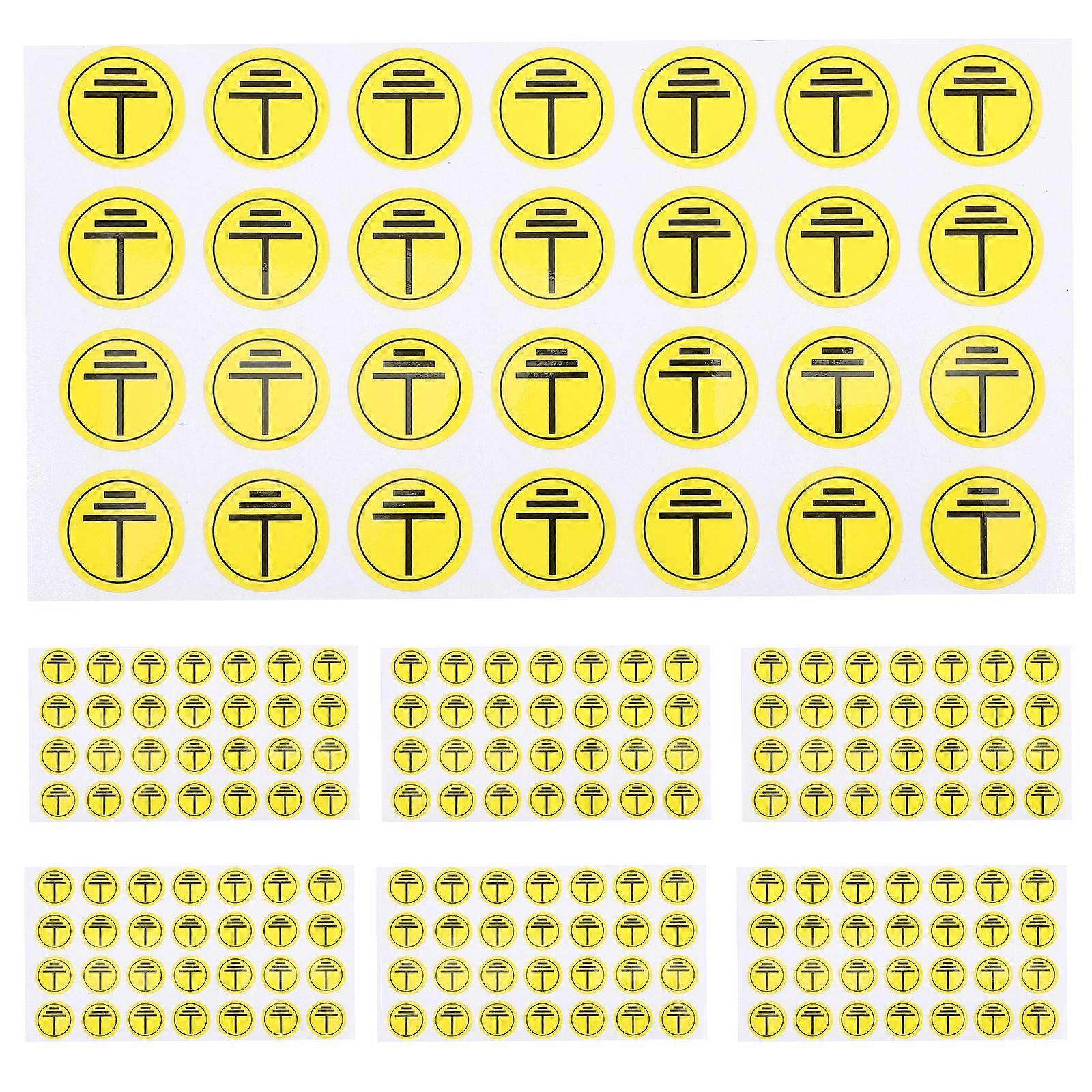 1 Aseta maadoitusturvatarrat, laitteiden varoitustarrat, sähkölaatikon varoitustarrat