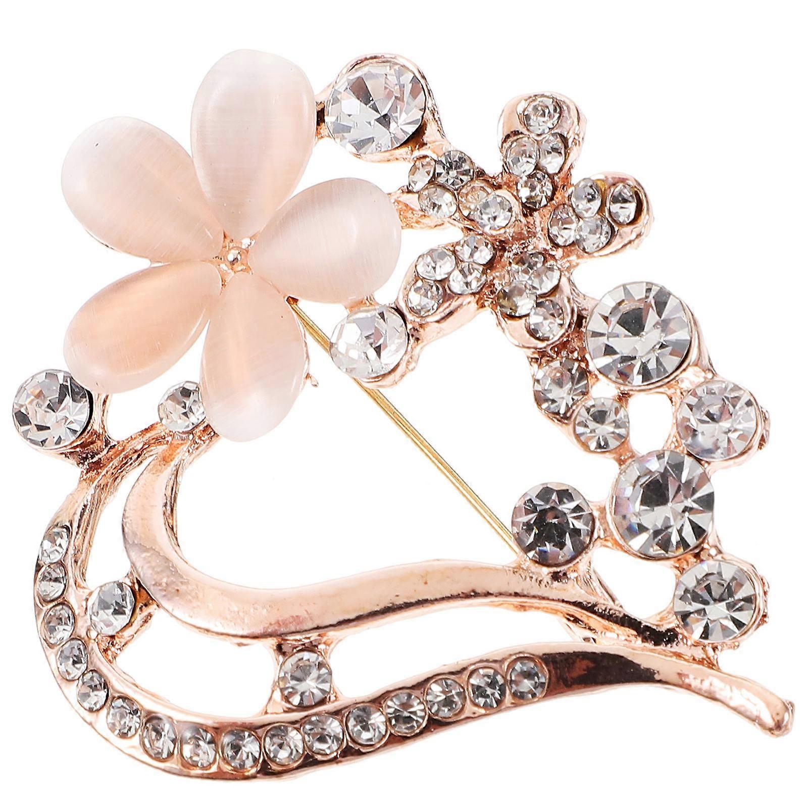 Here's a polished and professional product description based on the title you provided:

 

**Golden Rhinestone Heart Shaped Alloy Brooch with Plum