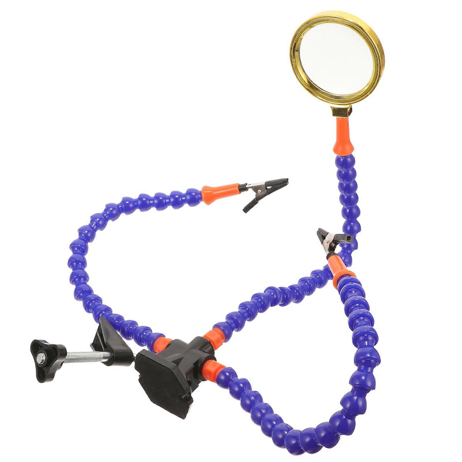 It sounds like you're referring to a product description for a **set claw welding clamp with a magnifying glass**, designed for **soldering and