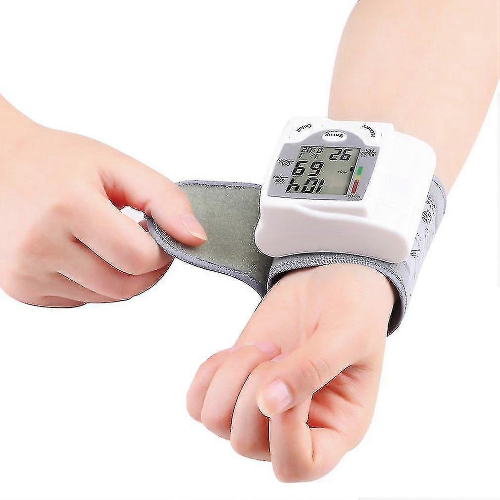 Digital LCD Wrist Blood Pressure Monitor Heart Rate Pulse Meter