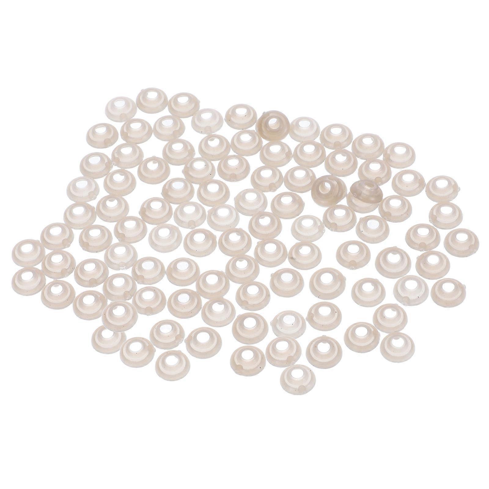 Here's a polished product description for your item:
**100 Pcs Small Plastic Gaskets for Doll Eyes & Noses – Essential Craft Accessories for