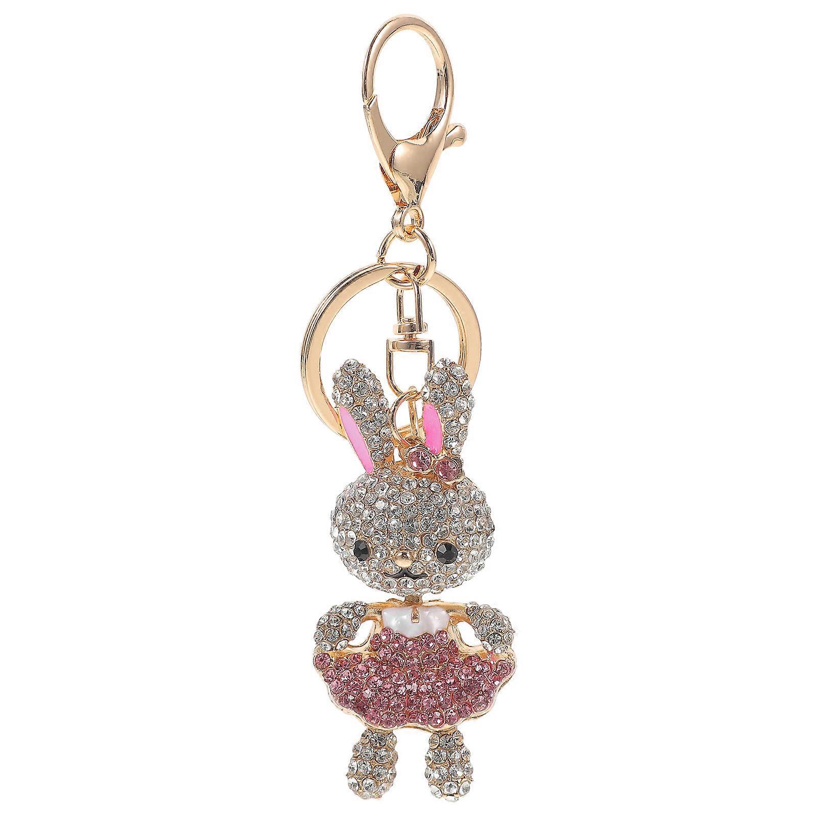 Here's a polished product description for your **Decorative Bunny Keychain**:

 

✨ **Eye Catching Bunny Metal Keychain with Rhinestones** ✨ 
Add a