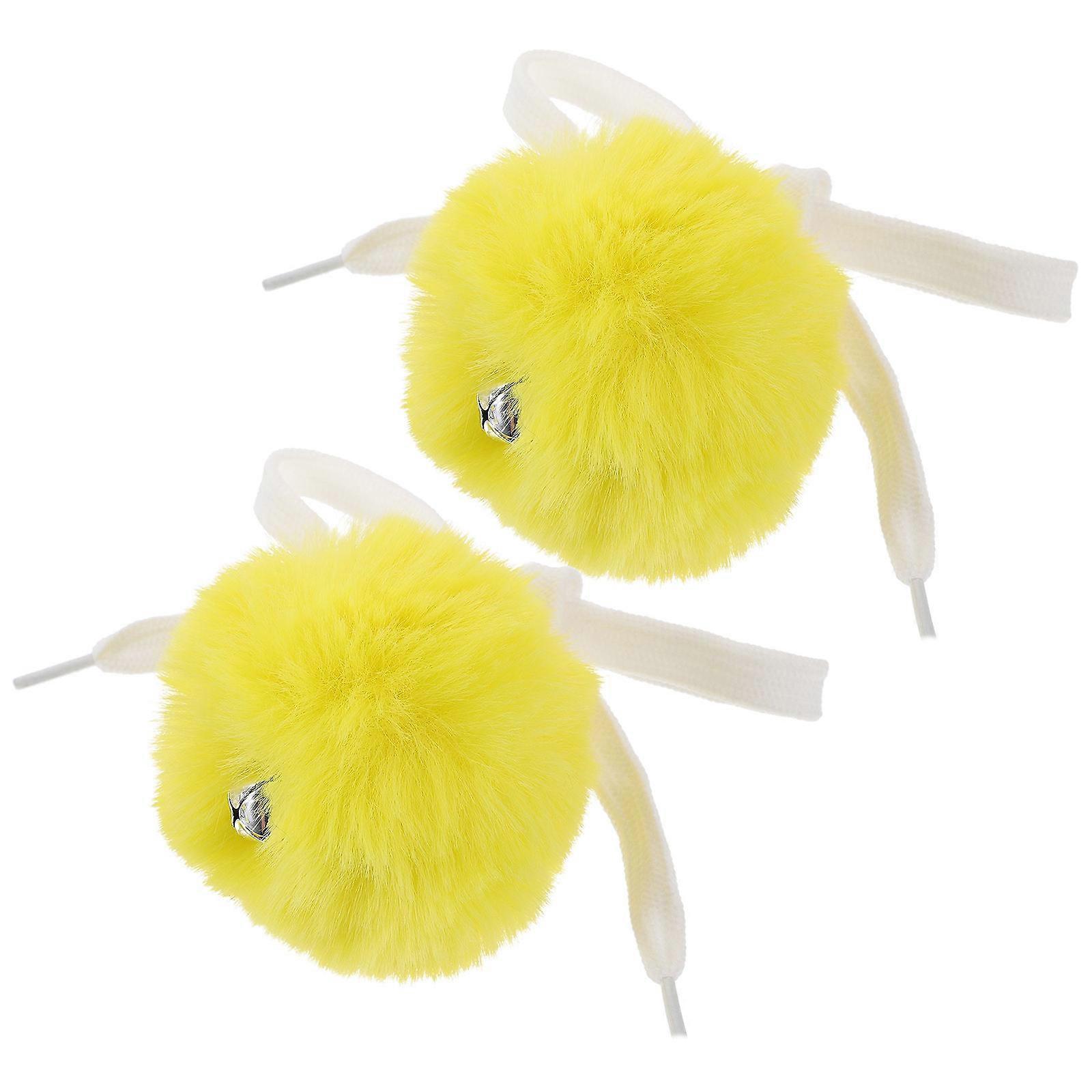 Rollschuh-Pompons mit Glöckchen, 4er-Set, Gelb
