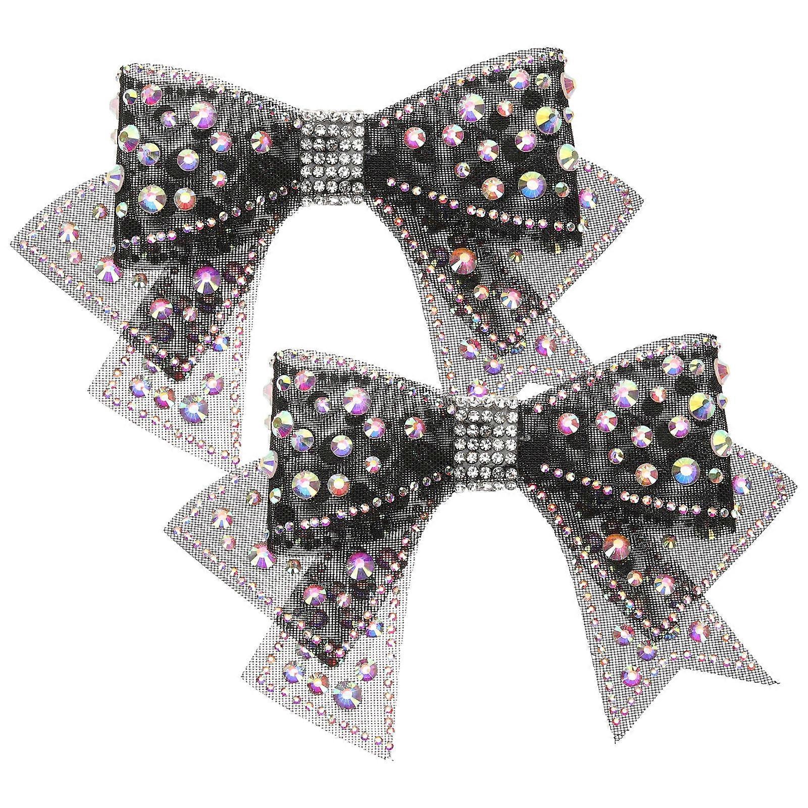 a refined and professional product description based on the title you provided:
**2pcs Rhinestone Crystals Bow Shoe Charms – Elegant DIY