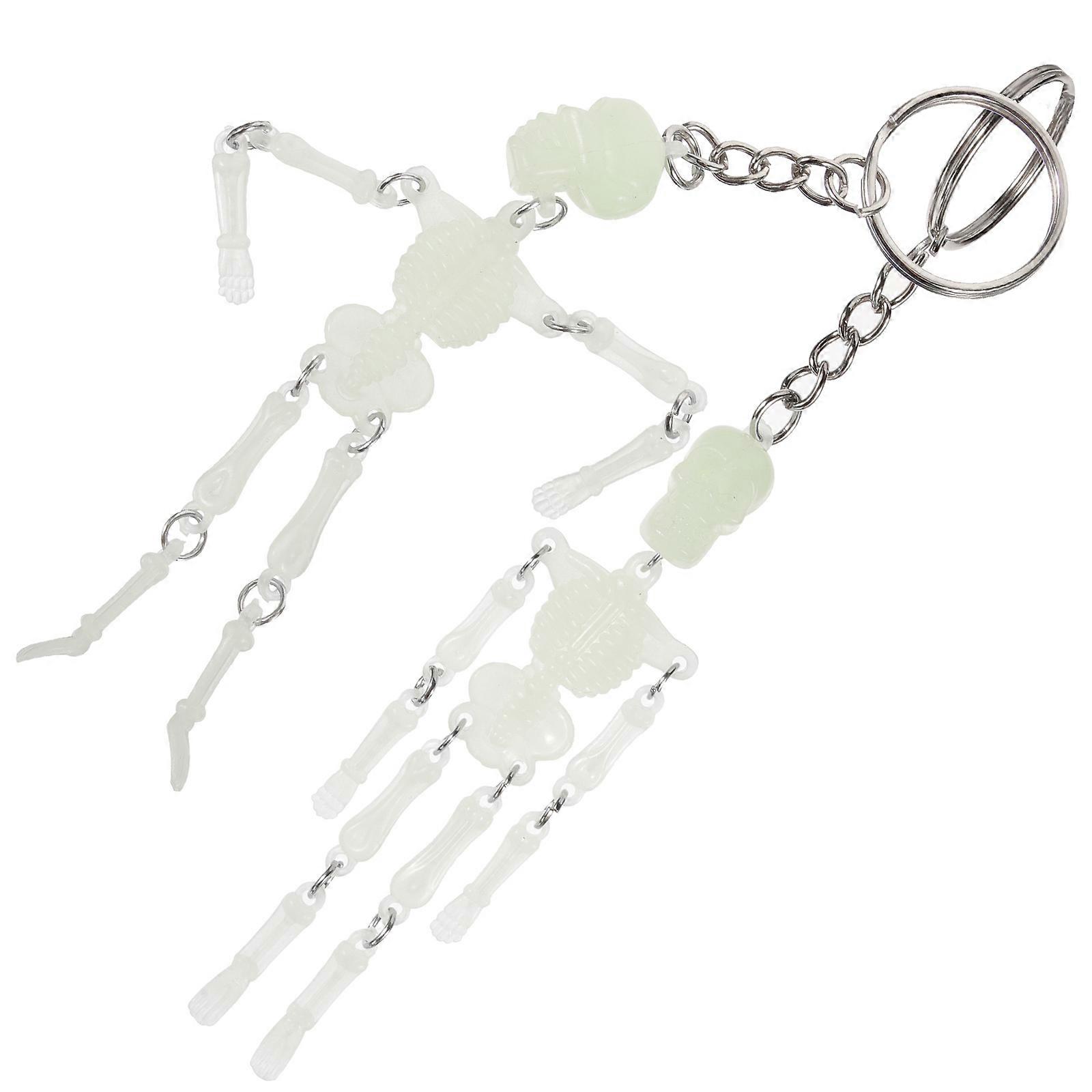 a refined product description based on your input:
 
**2 Pcs Glowing Skull Keyrings – Halloween Skull Keychain Bag Charm**
Add a spooky yet