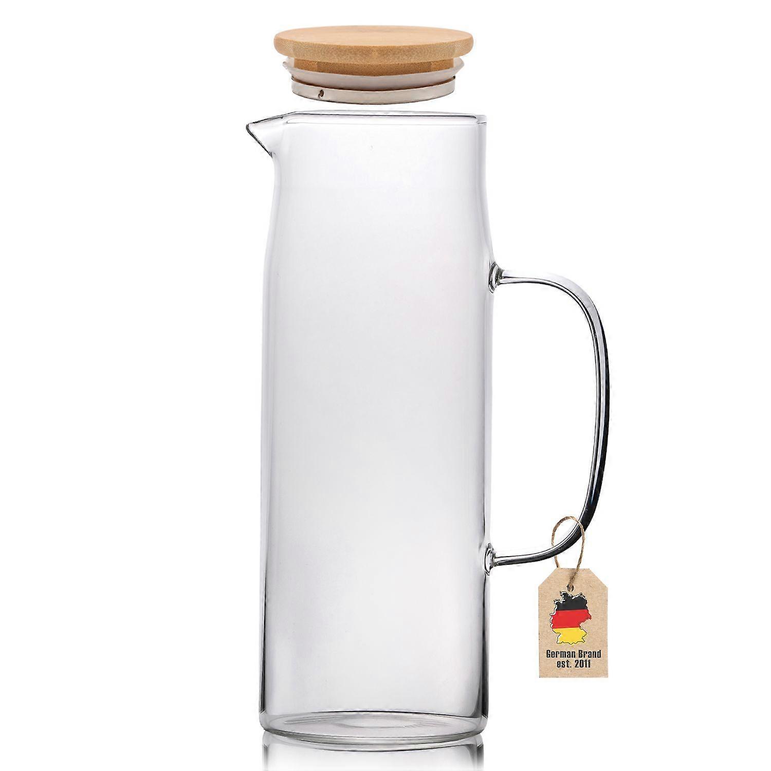 Carafe with bamboo lid in CLEAR – 1.3l pitcher made of borosilicate glass with handle and wooden lid