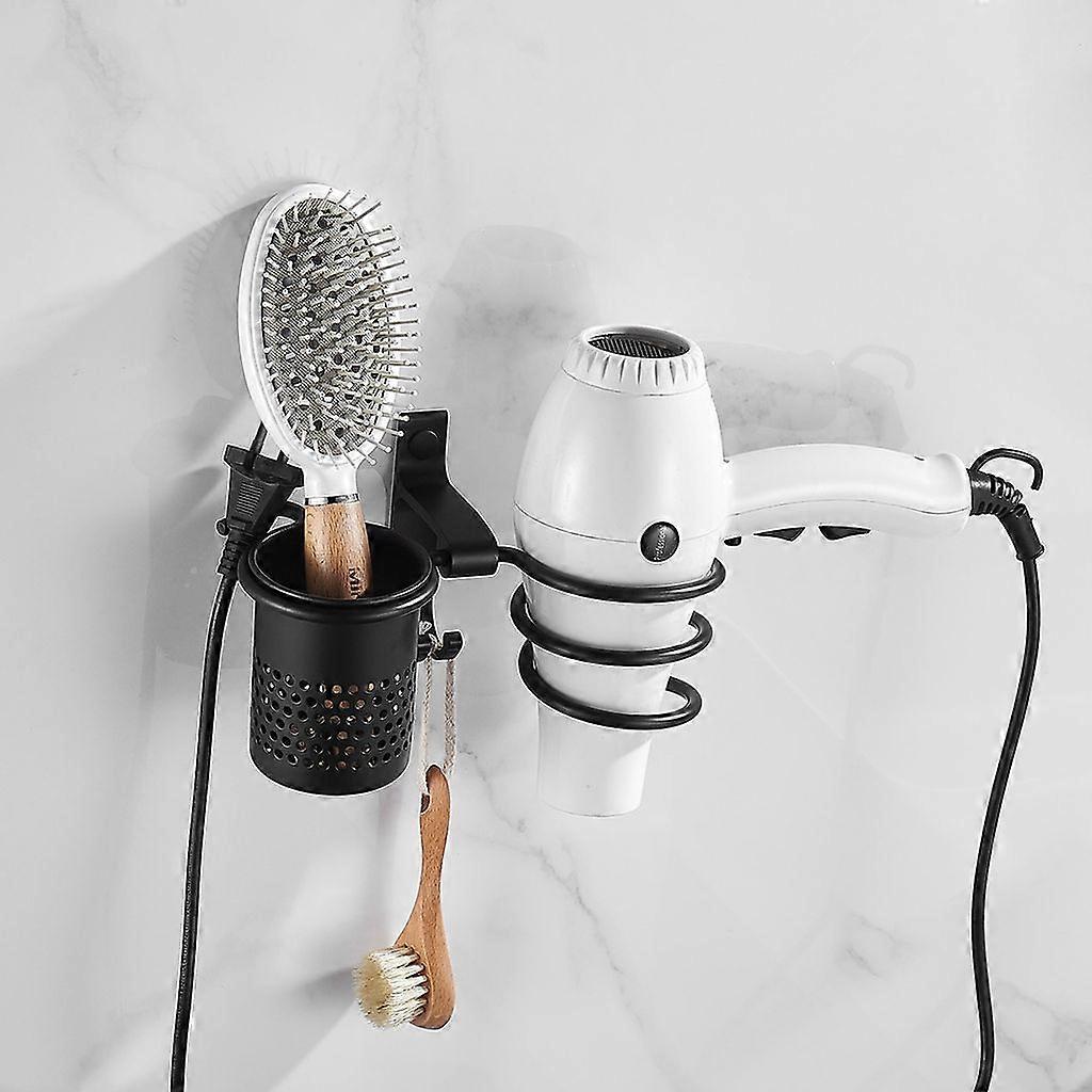 Schwarzer perforierter oder selbstklebender Haartrocknerhalter für das Badezimmer.
