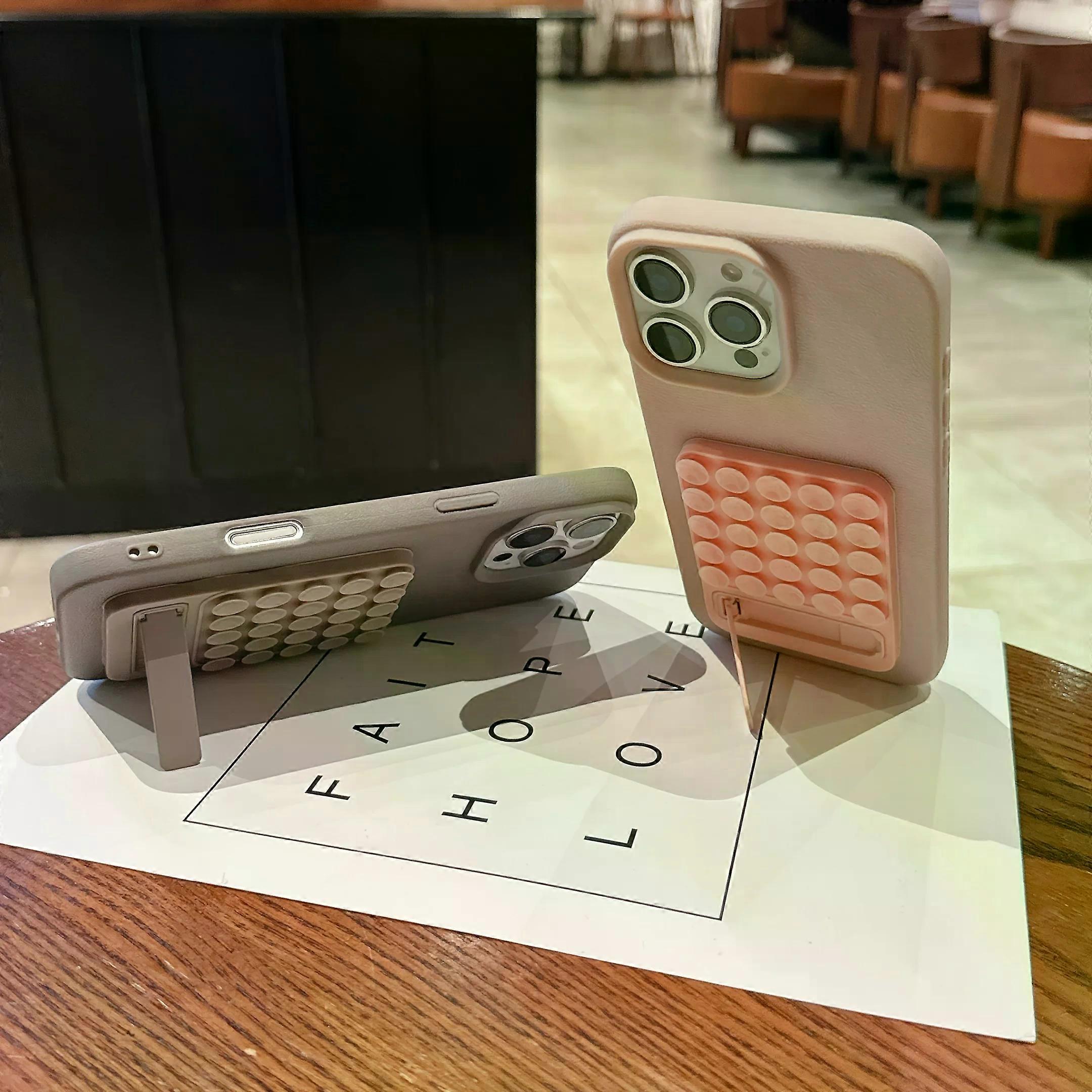 One-Piece Silicone Suction Cup Holder Multifunctional Folding Desktop Stand Strong Adhesion to Smooth Surfaces Comfortable Grip