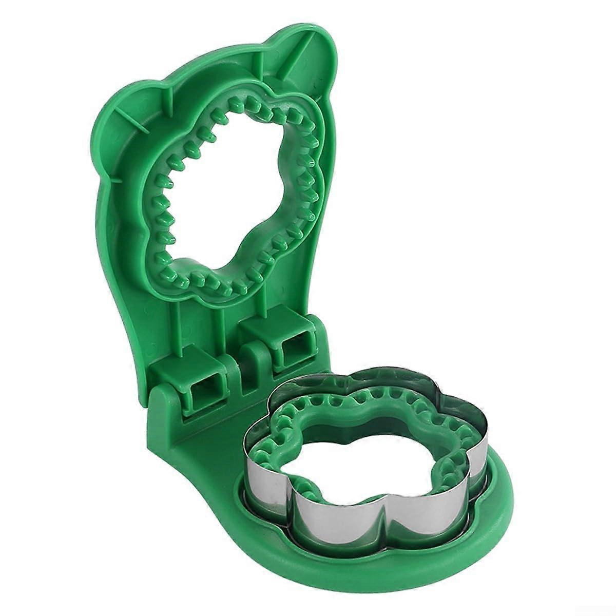 Enjoy imaginative meals with a sandwich cutter and sealer in a flower shape (green).