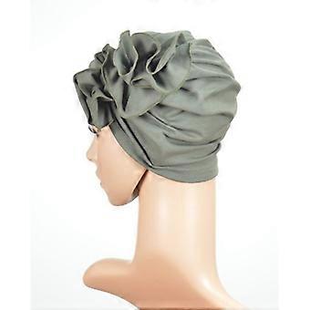 A khaki headscarf with a pleated design, plain, which she continued to wear even after chemotherapy.