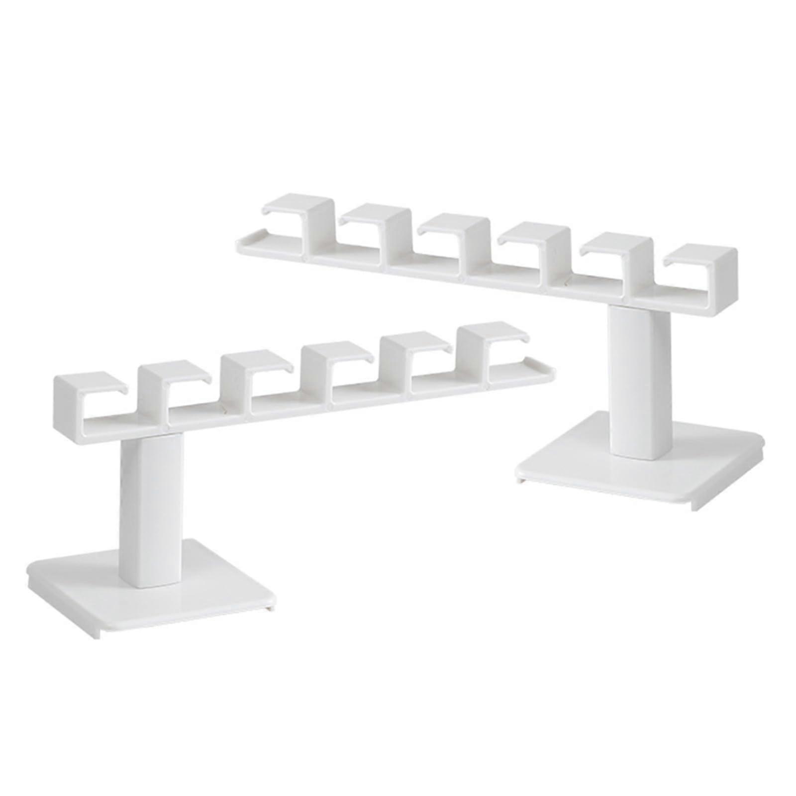 Practical organizers that are mounted on the wall without requiring drilling to achieve quick tallation loads for efficient space utilization.