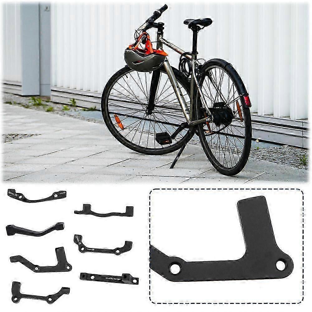 Mtb-pyörän levyjarruroottorit edessä takana IS/pm jarrusatulan sovittimen pylväskiinnitys