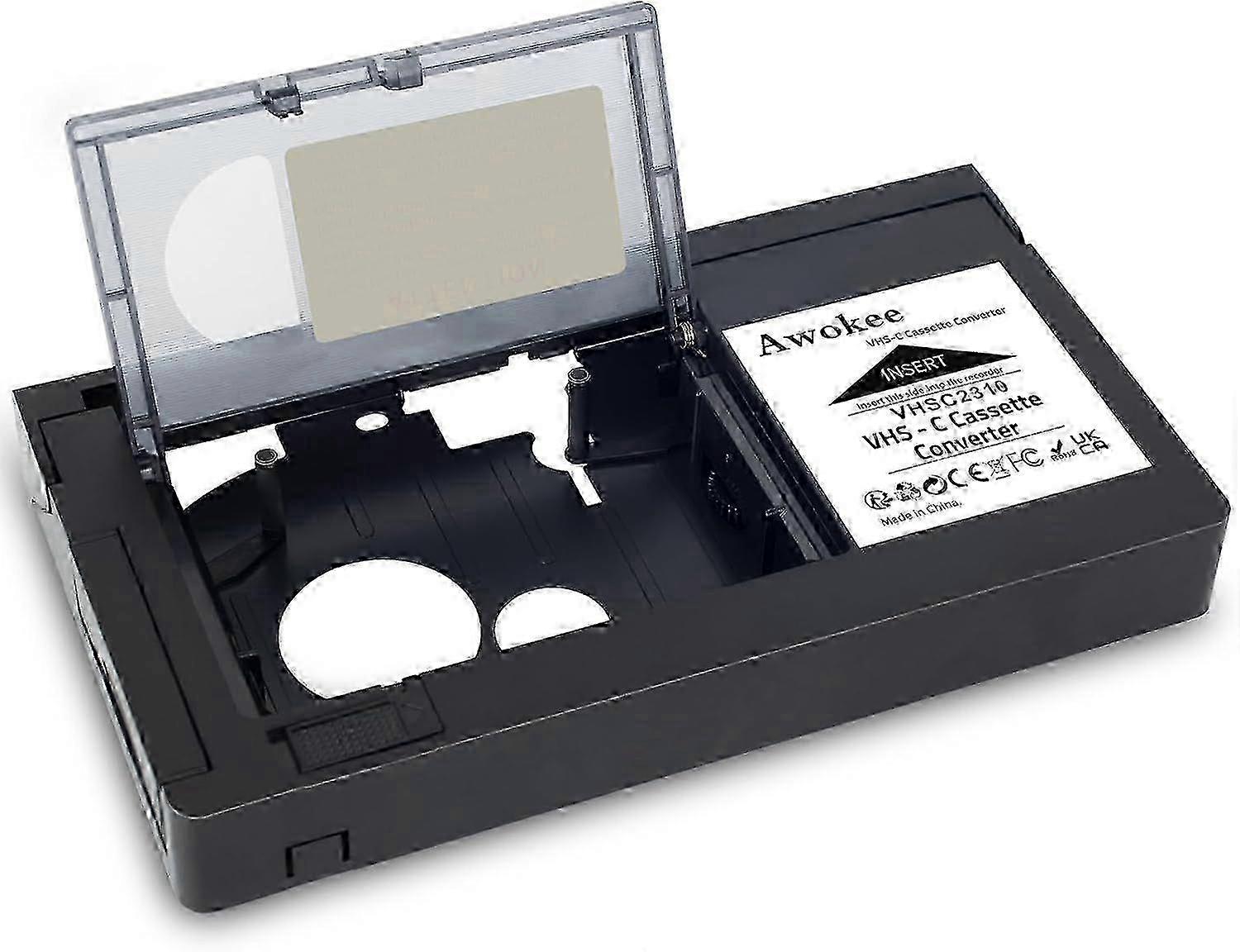 De VHS-C naar VHS-adapter speelt VHS-C- en Super VHS-C-camcordervideocassettes af in een standaard VHS-videorecorder. Het apparaat werkt niet met of speelt niet: M