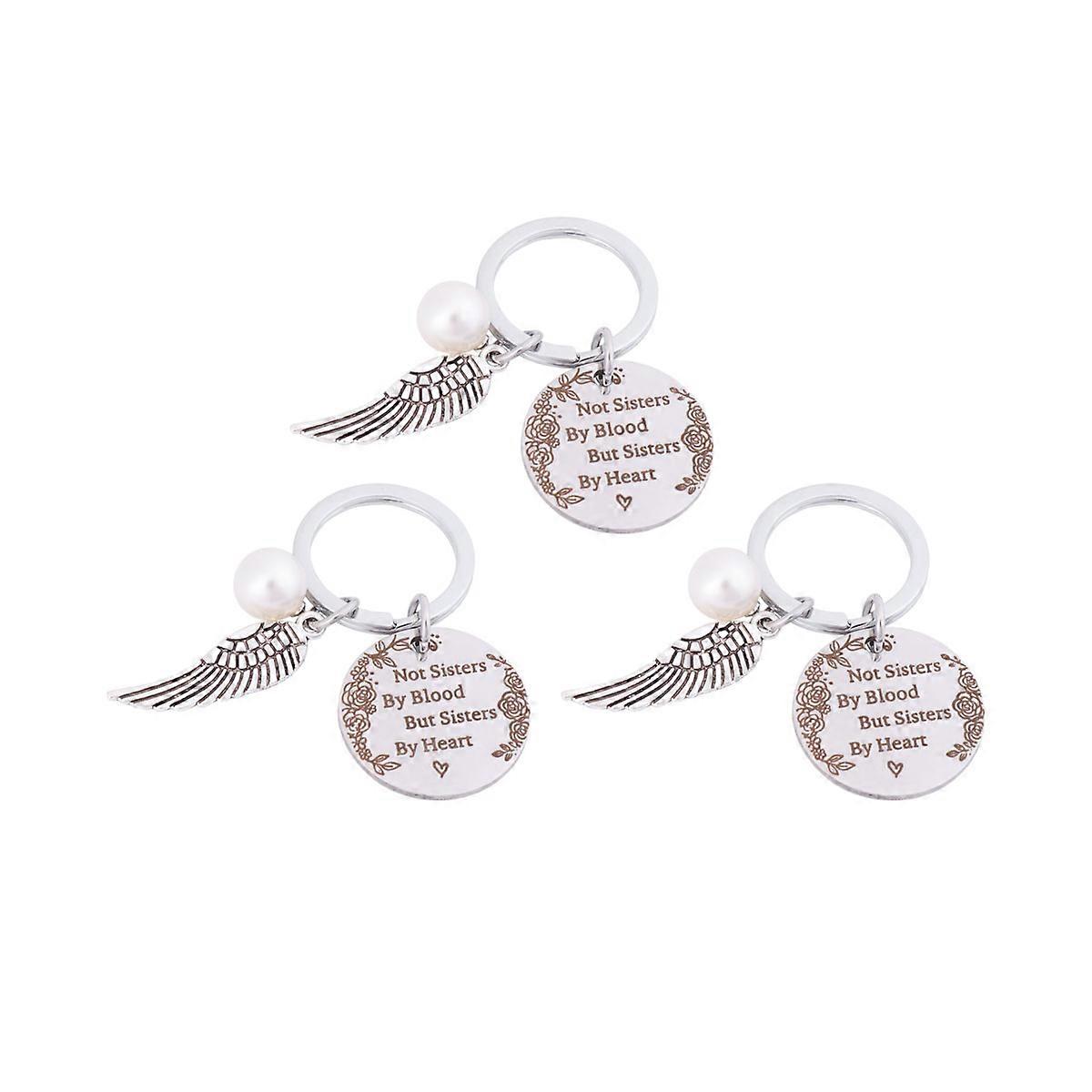 Keychains with Winged Ornamentation and Pearl Inlays for Versatile Use