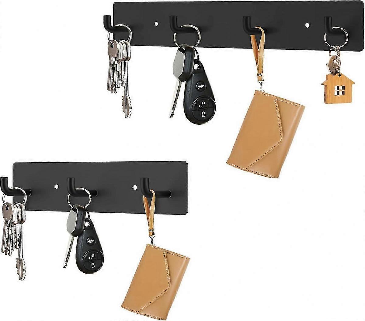 Ο τοίχος κάτοχος κλειδιών τοποθετεί, μαύρη αυτοκόλλητη βασική ράγα κρεμάστρων μετάλλων με το κλειδί