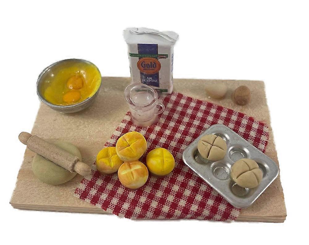 بيت الدمى الخبز الكبير قيد التقدم على متن ملحق طعام المطبخ المصغر