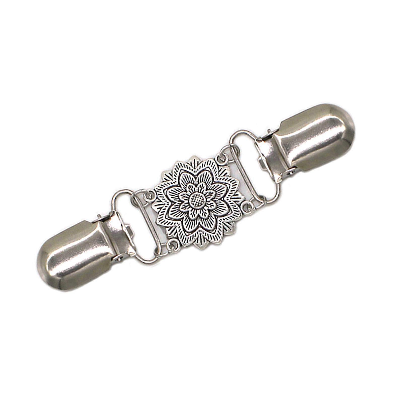 Broche indispensable pour les voyages, à clipser sur robes, châles et chemises. Multicolore.