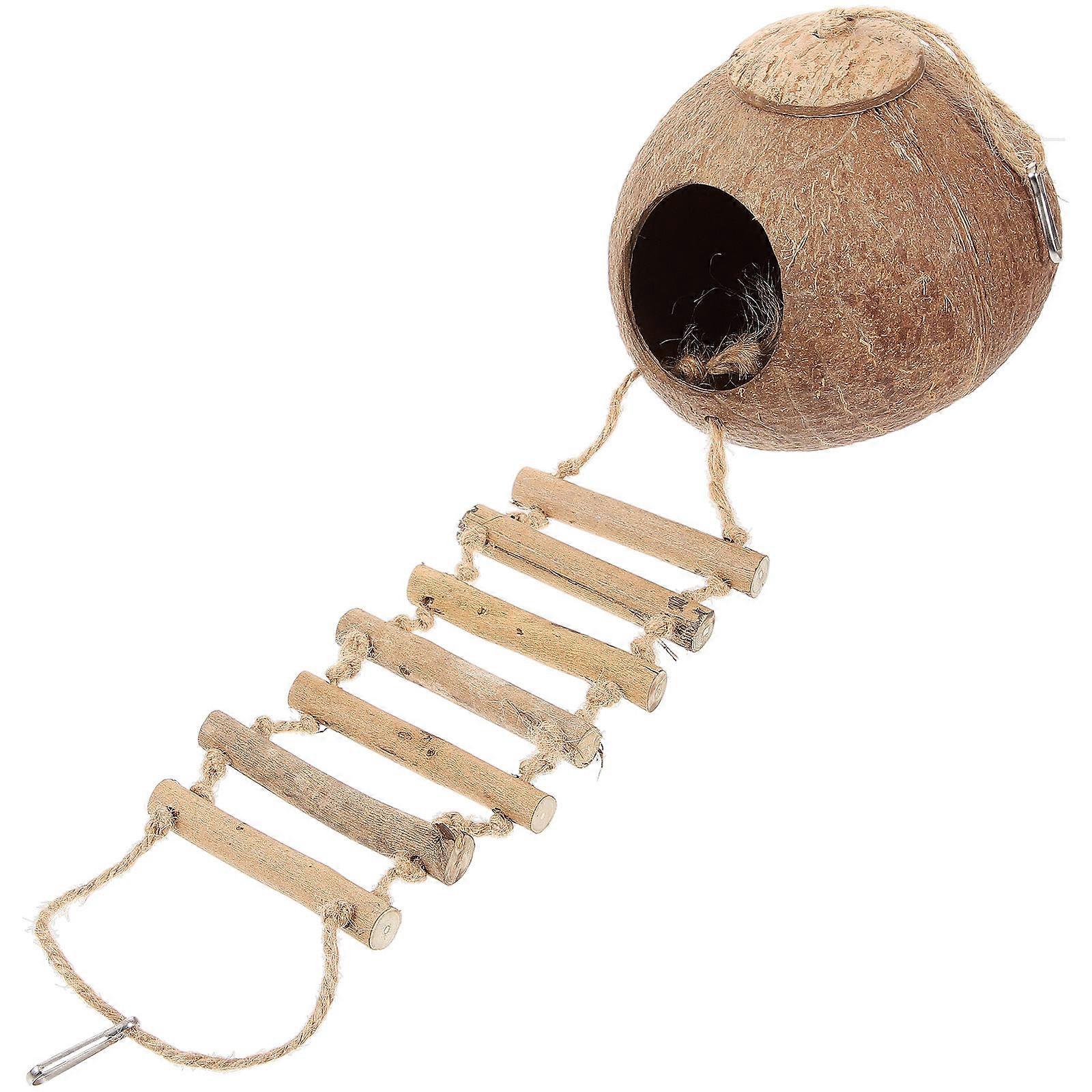 The **Coconut Shell Bird Nest with Ladder** is a charming and decorative birdcage or nesting accessory designed for small birds and parrots. It