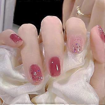 Unhas postiças doces translúcidas cor-de-rosa Unhas plásticas Colagem lustrosa em modelos falsificados da colagem dos pregos