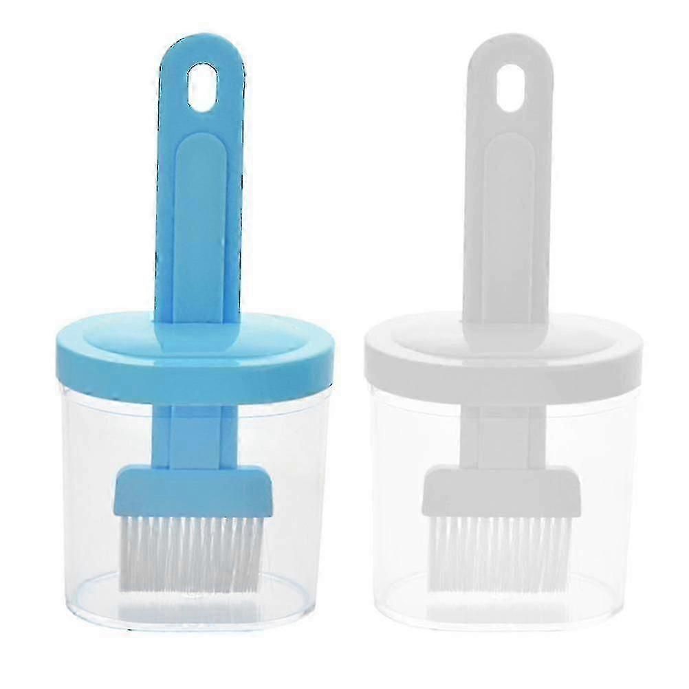 2 hot brushes with containers