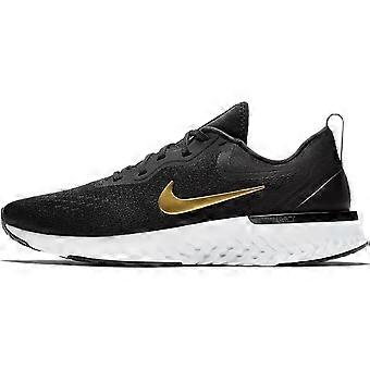 Nike Odyssey React Preto Dourado Metálico Feminino AO9820-011