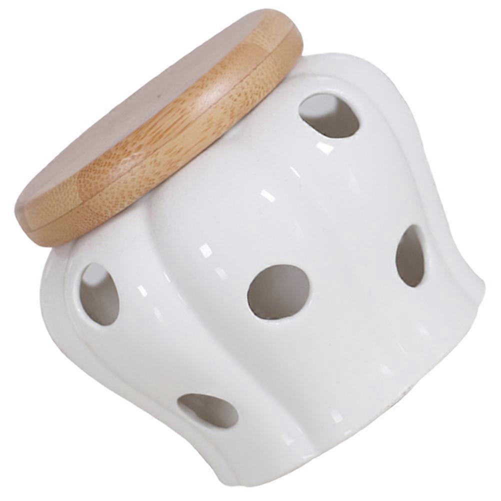 White Ceramic Garlic Keeper with Ventilation Holes for Fresh Storage in Kitchen