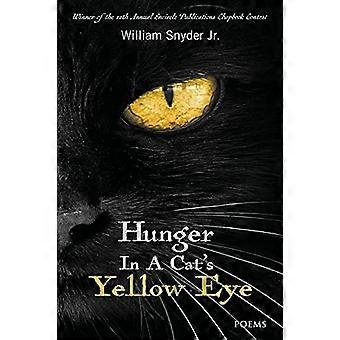Hunger im gelben Auge einer Katze