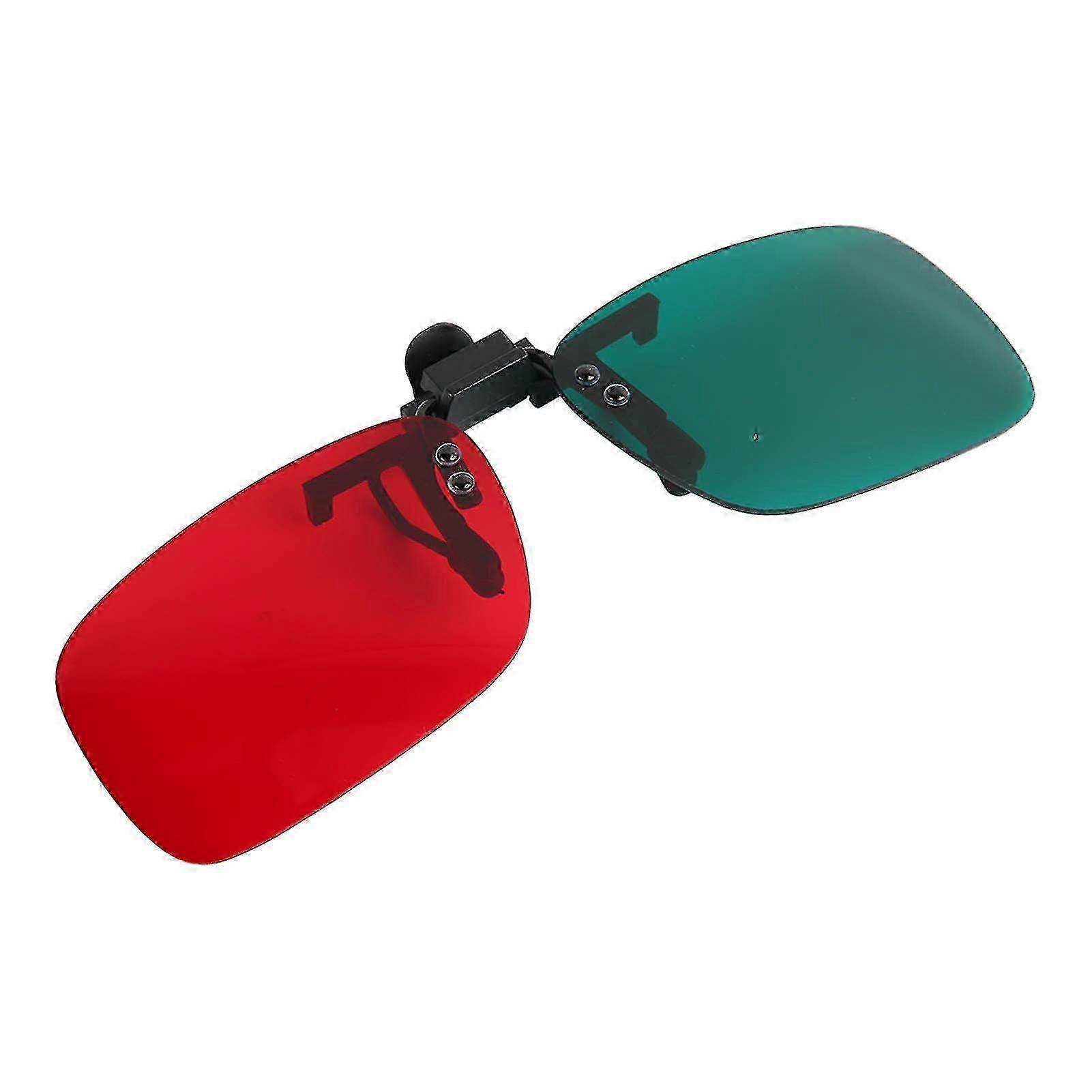 Clip-On Glasses for Amblyopia Correction with Green and Red Lenses