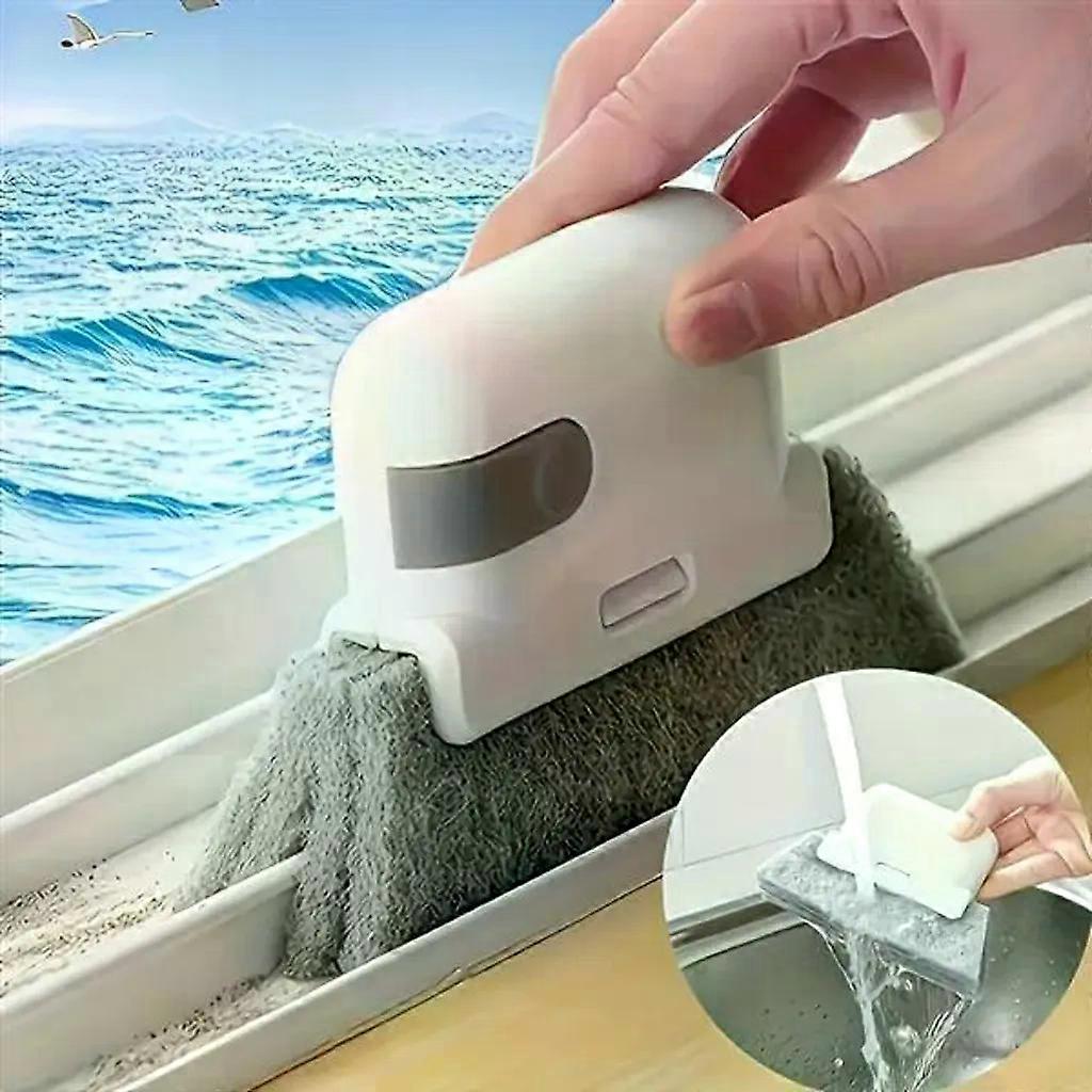 Multifunctional hand brush for window frames and kitchen rails