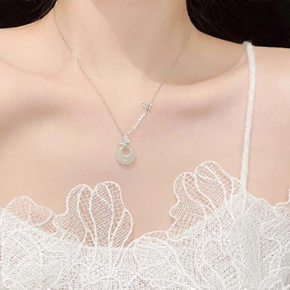 This butterfly and round pendant necklace features an exquisite design, symbolizing harmony. It's an elegant and versatile gift. Comfortable to wear.