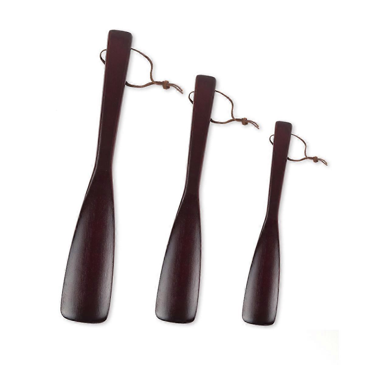 Travel-Friendly Wooden Shoe Horn with Sturdy Handle, Enhances Convenience for Users