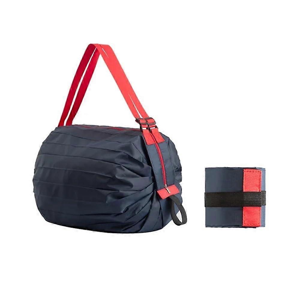 Environmentally friendly, foldable tote bag – leakproof, durable shopping and beach bag with shoulder strap and wrist loop in black.