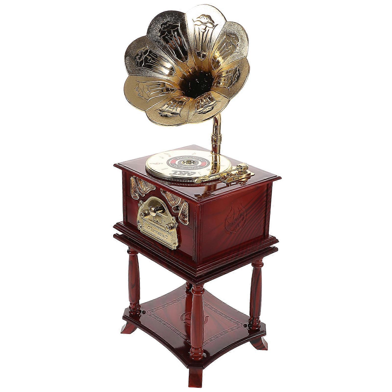 Here's a polished and engaging product description for the **Vintage Mini Gramophone Music Box**:
 
### **Vintage Mini Gramophone Music Box –