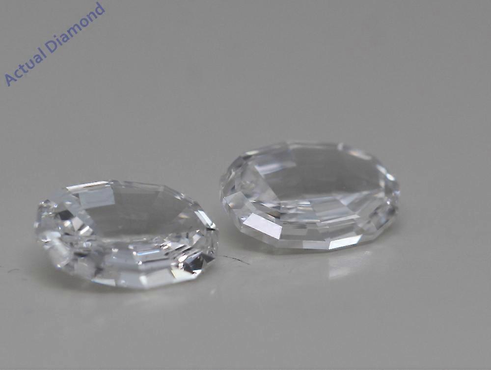 A Pair of Oval Step Cut Cut Loose Diamonds (1.31 Ct,E Color,VS1-SI1 Clarity)